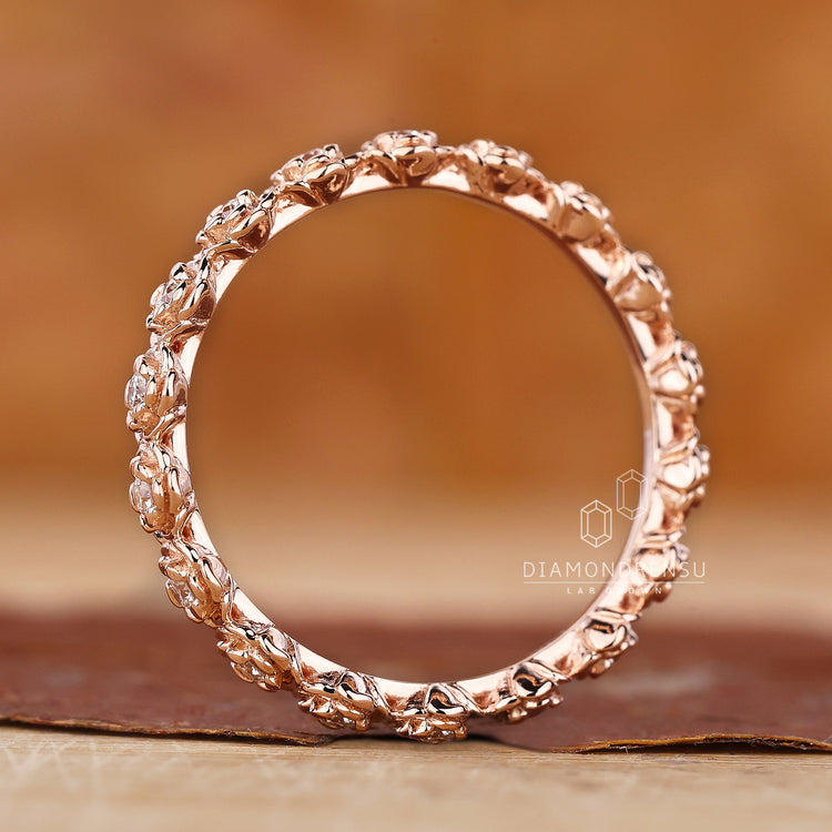 Round diamond wedding band with eternity setting
