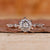 Pave Setting Ring with round cut side stone in rose gold.
