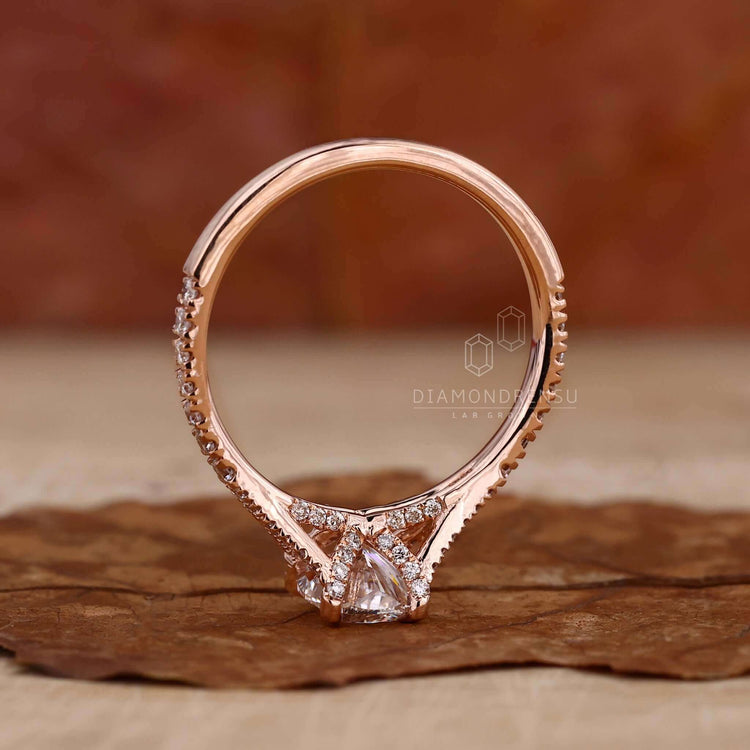 Cushion cut diamond elongated design showcasing a claw prong setting for a modern and stylish look.
