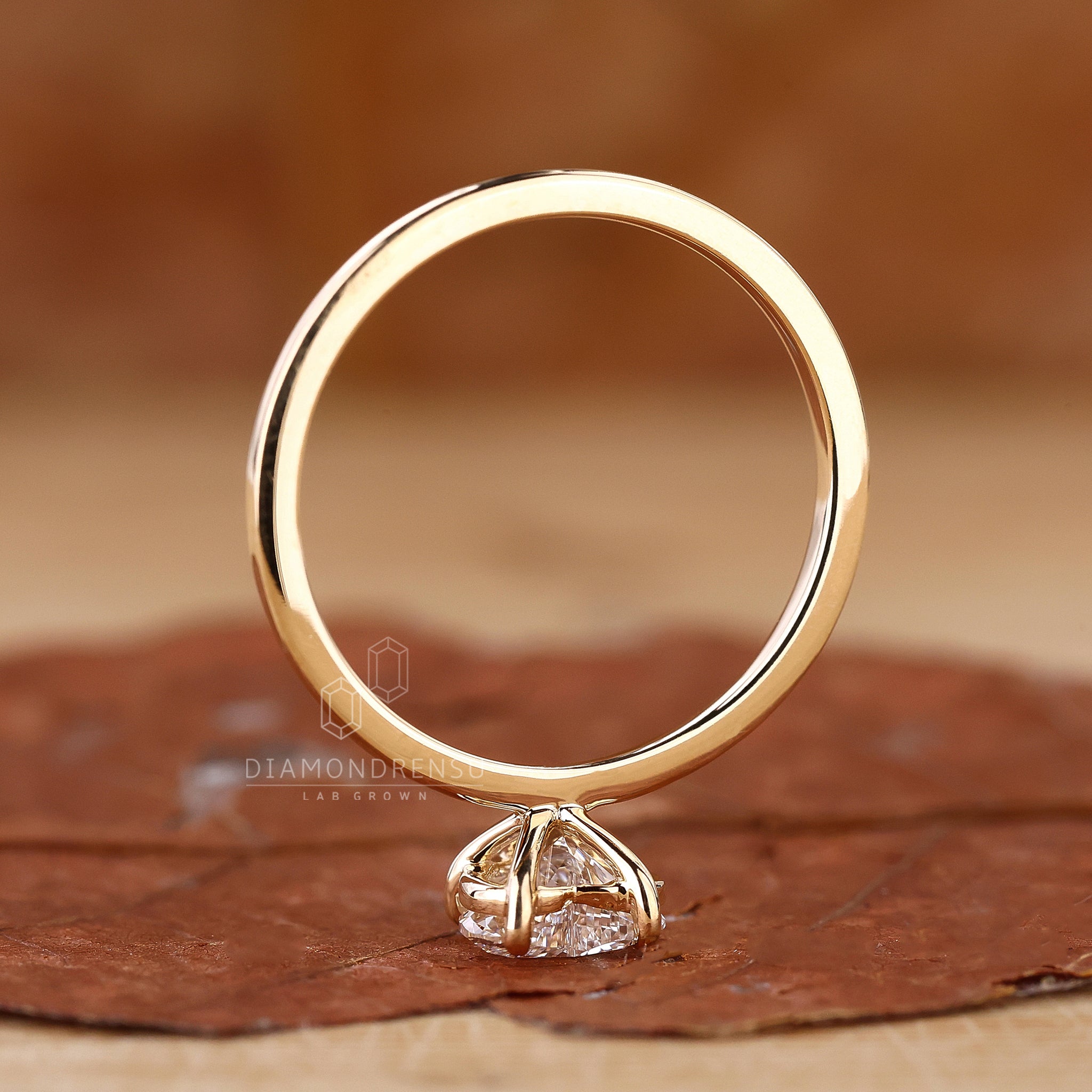 UK engagement ring with heart solitaire style.
