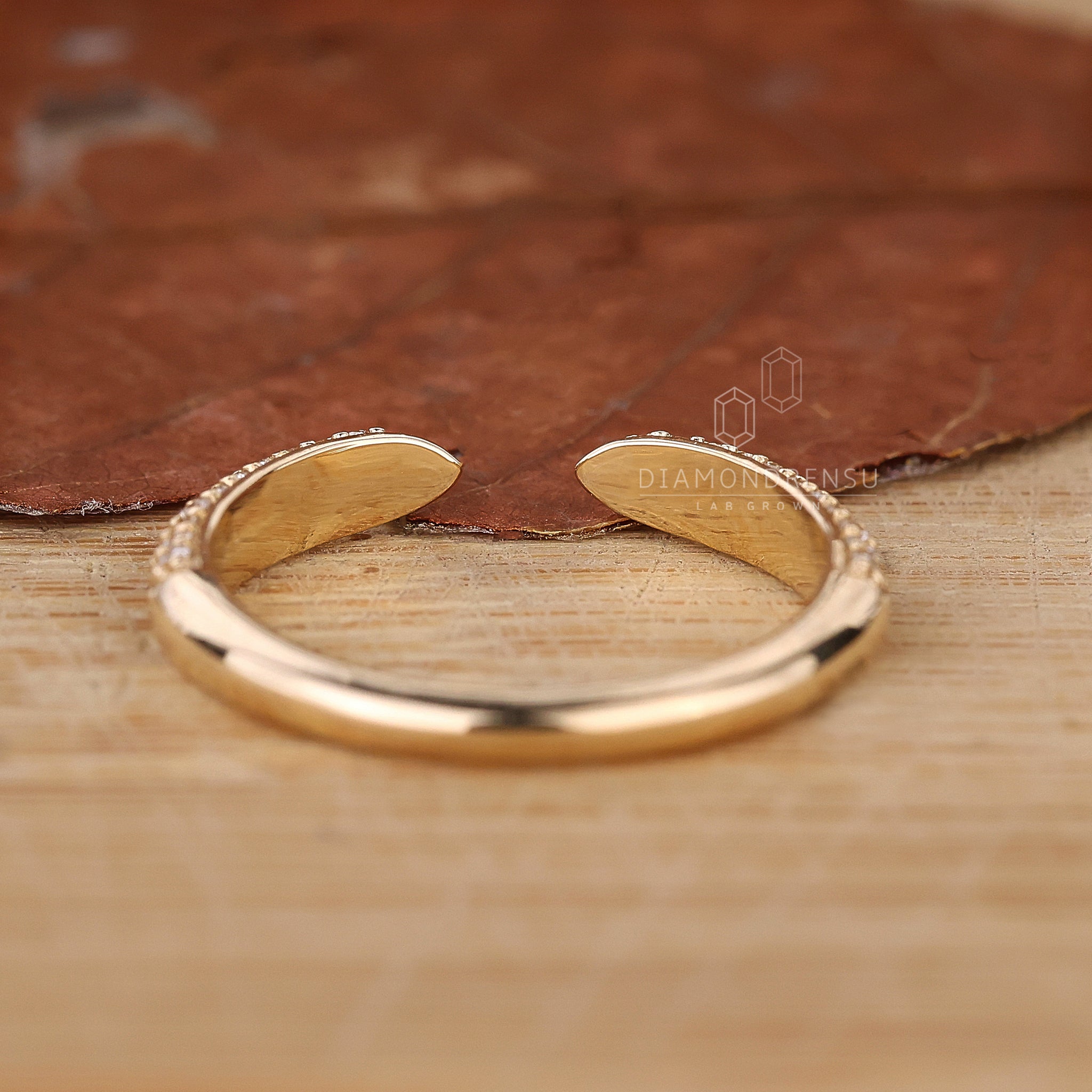 Three row diamond band with round cut diamonds.
