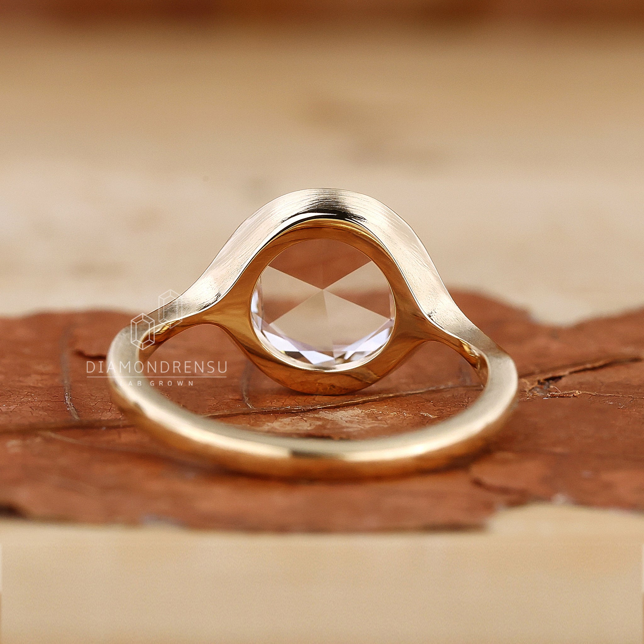 Yellow gold engagement ring with rose cut.
