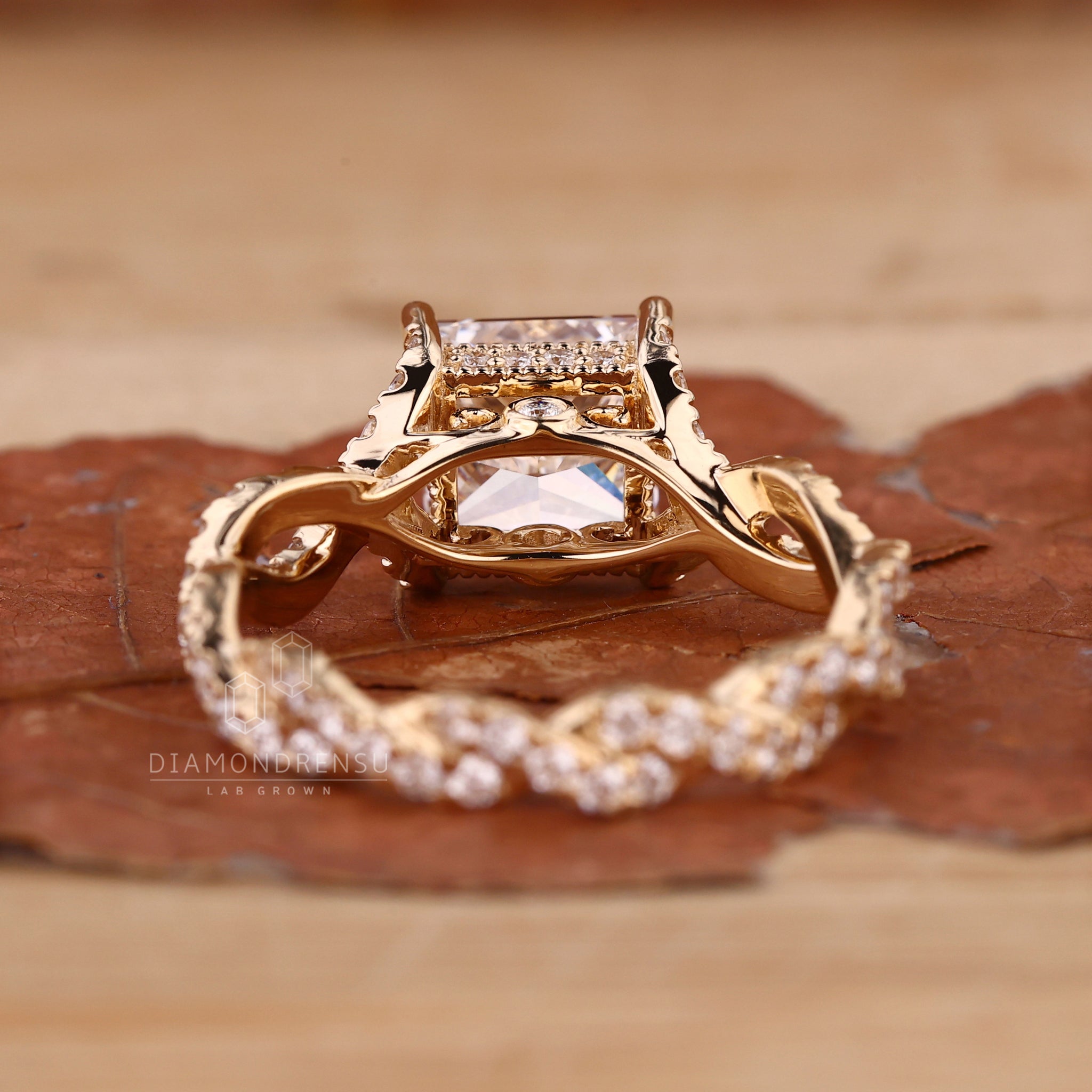 Prong setting holds the princess cut diamond in place.
