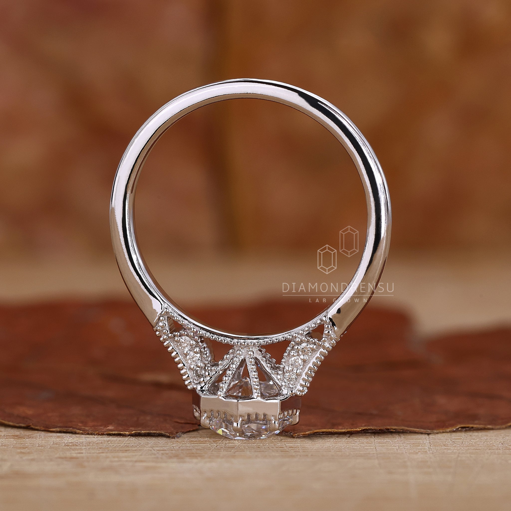 8 round prong setting octagon diamond ring.
