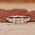 Oval diamond wedding band in yellow gold.
