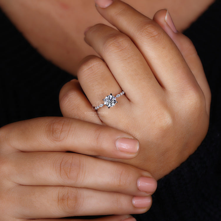 Round diamond engagement ring UK design.
