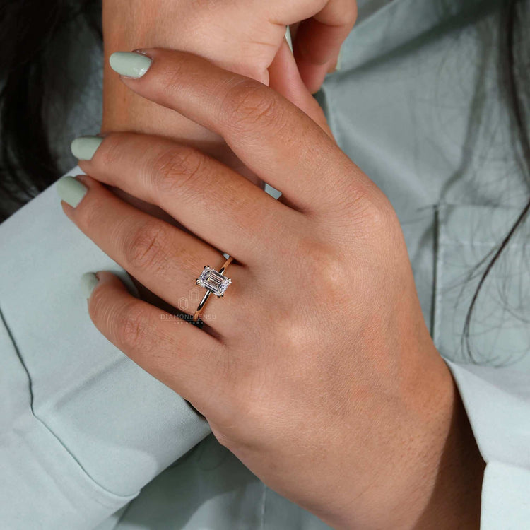 Unique emerald cut diamond ring with a modern and classic vibe.