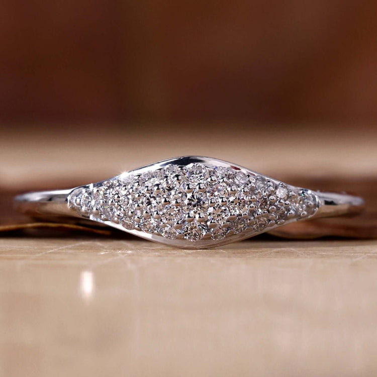 Elegant diamond signet ring showcasing modern craftsmanship.