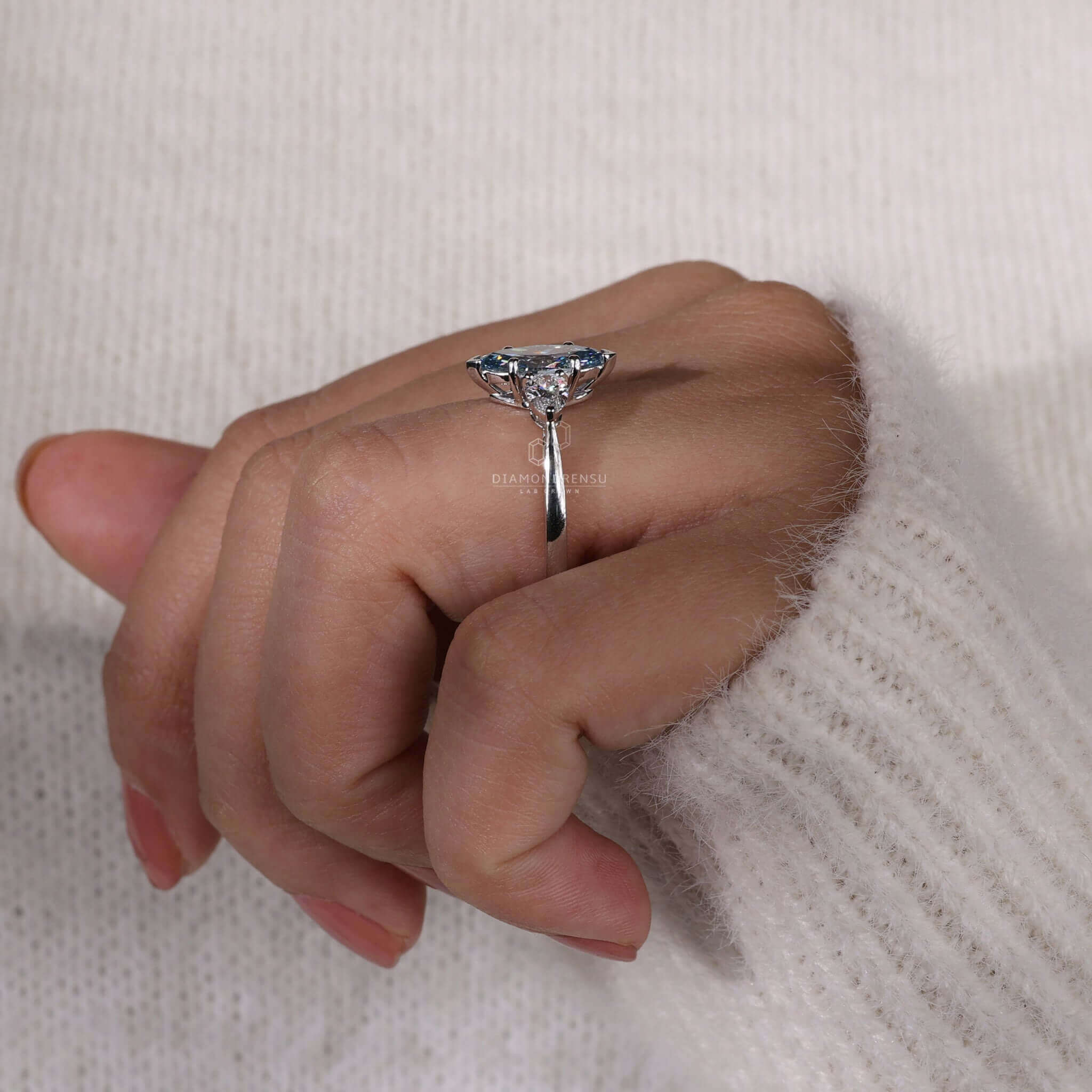 Handmade pear diamond ring featuring lab grown diamonds.