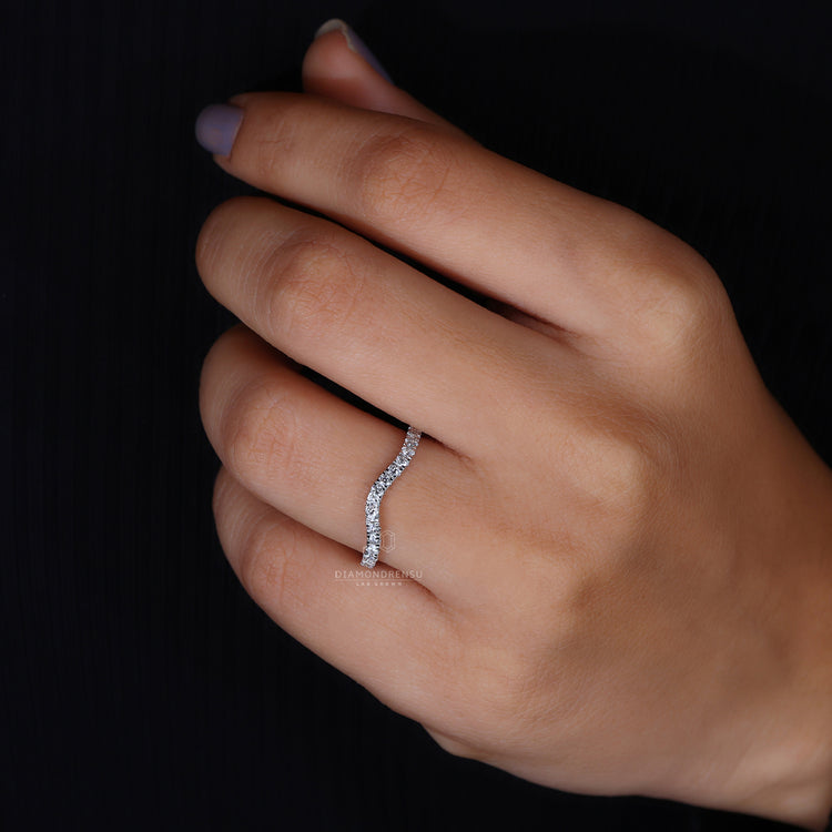 Stackable half eternity diamond wedding band.
