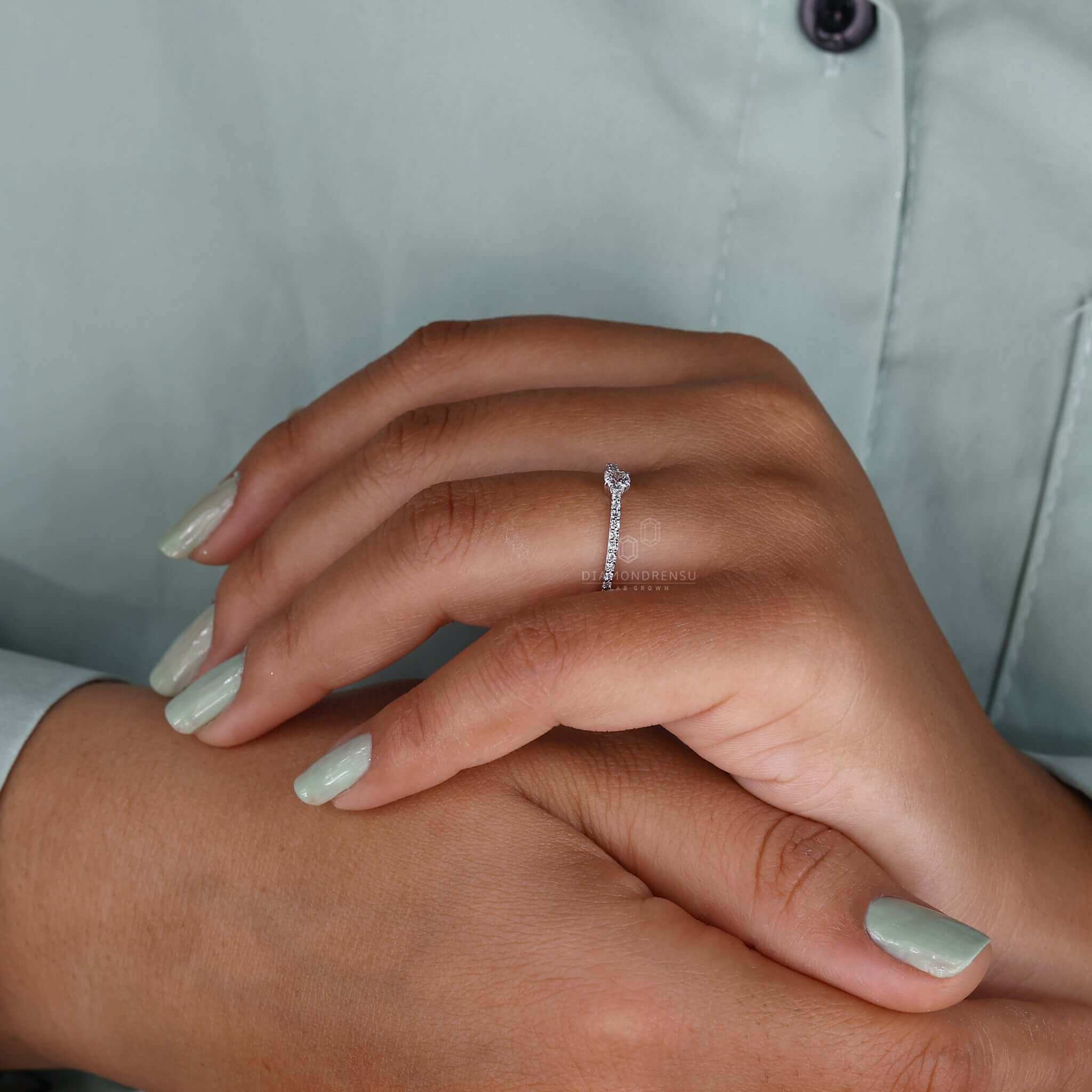 Diamondrensu UK engagement ring featuring a handmade design.