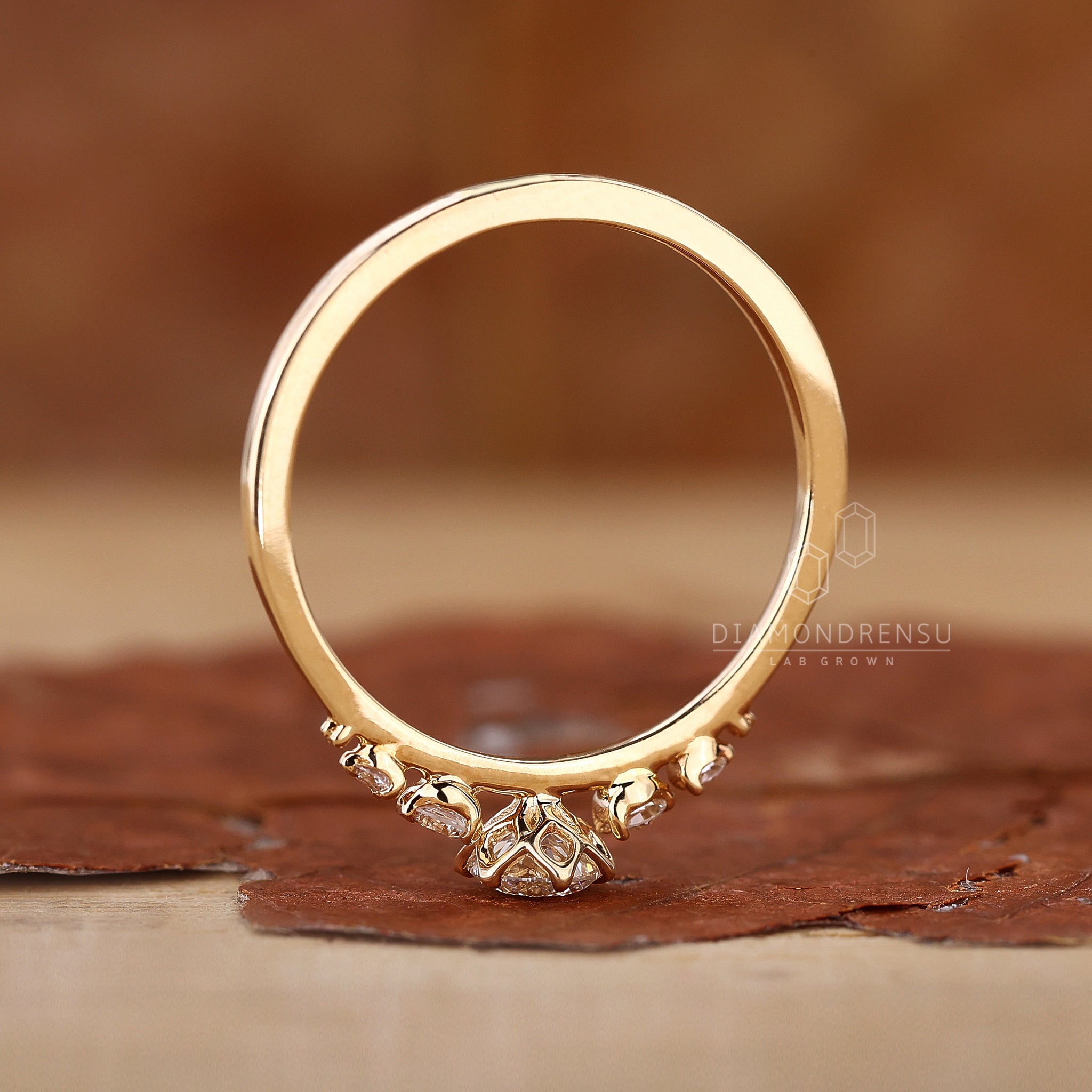 Diamonds London UK five stone ring.
