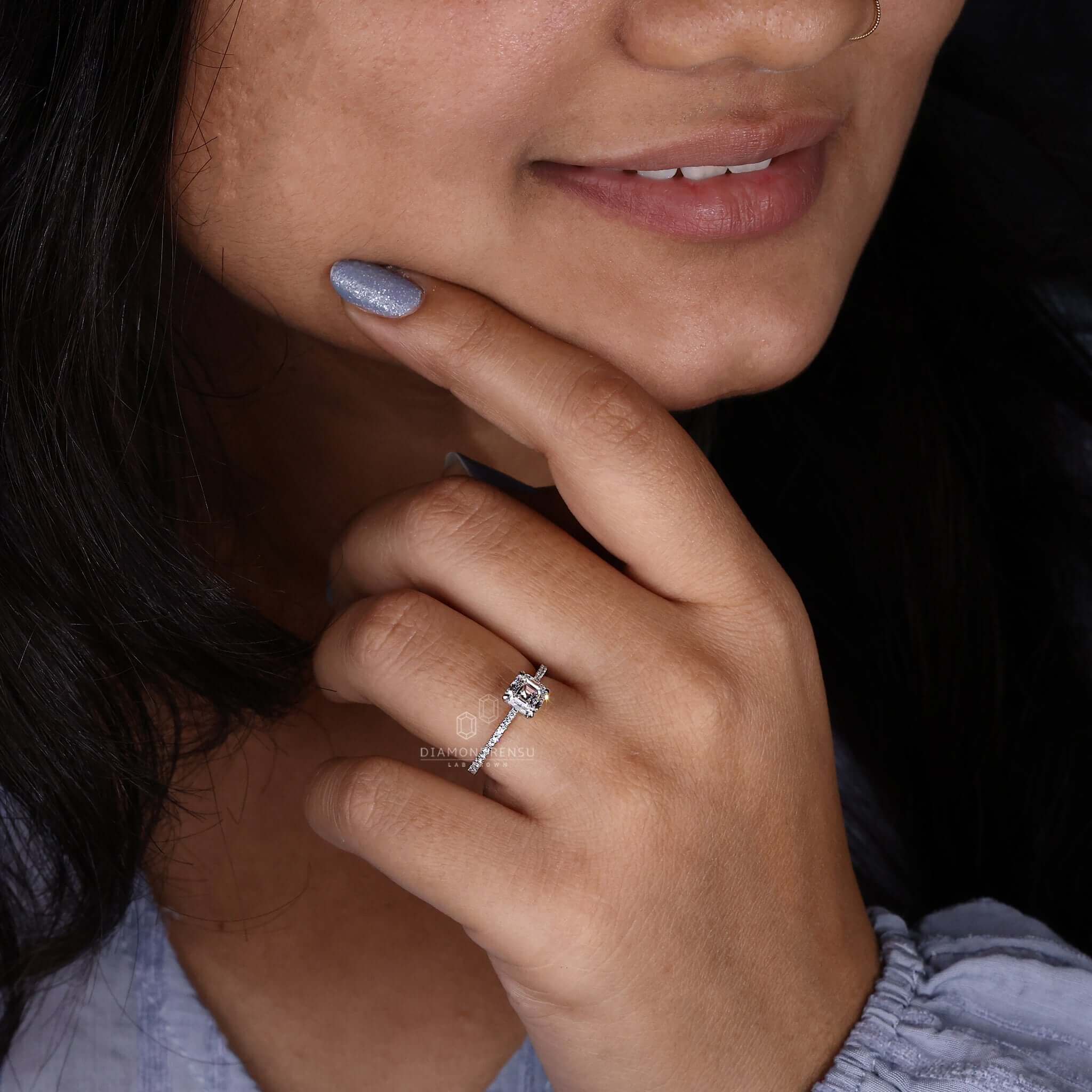 Elegant claw prong ring featuring a unique asscher cut diamond.