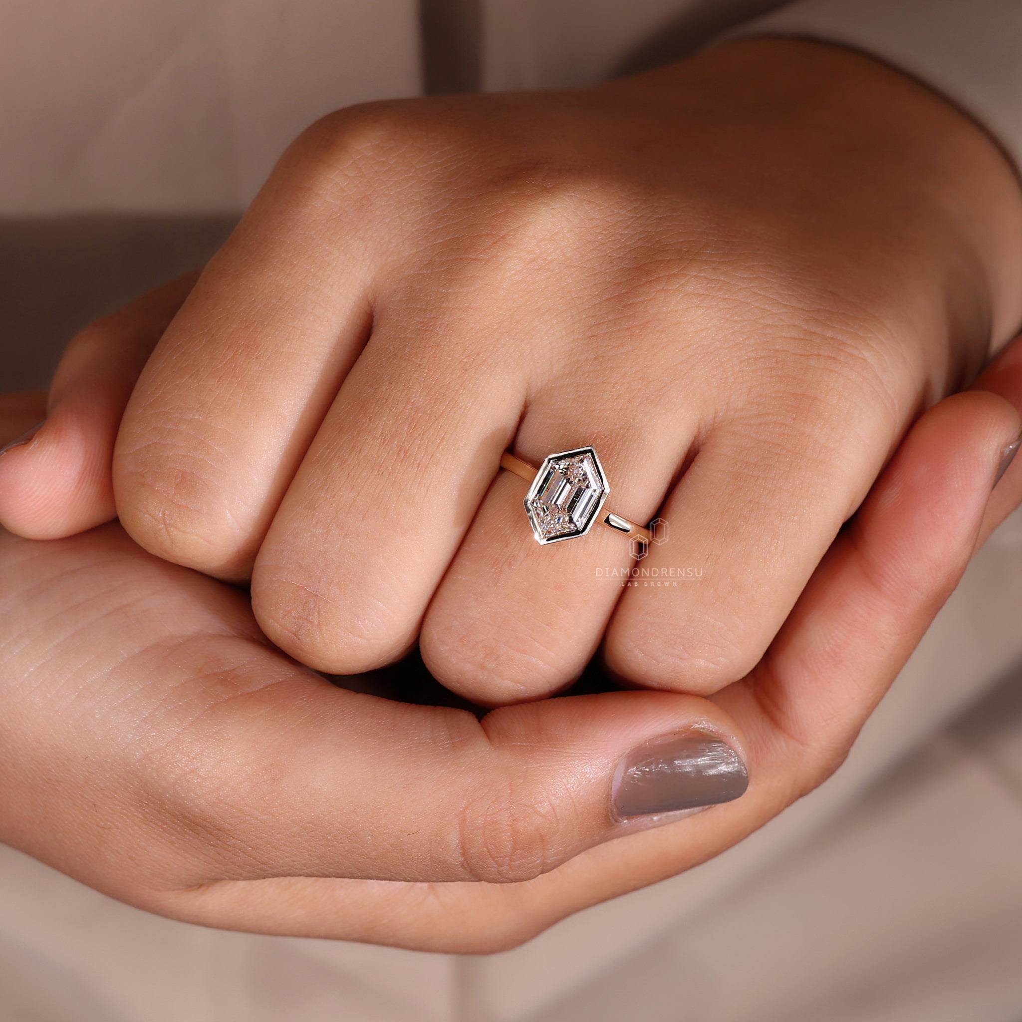 Simple engagement ring with solitaire engagement ring features.
