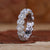 Halo wedding band with round cut diamonds in white gold
