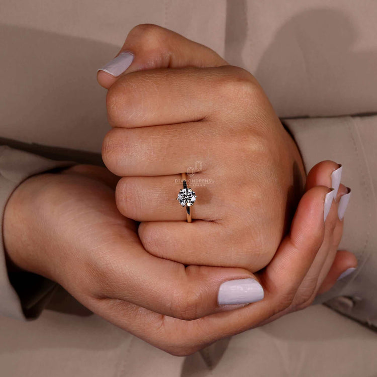 Solitaire engagement ring featuring a unique claw prong setting.