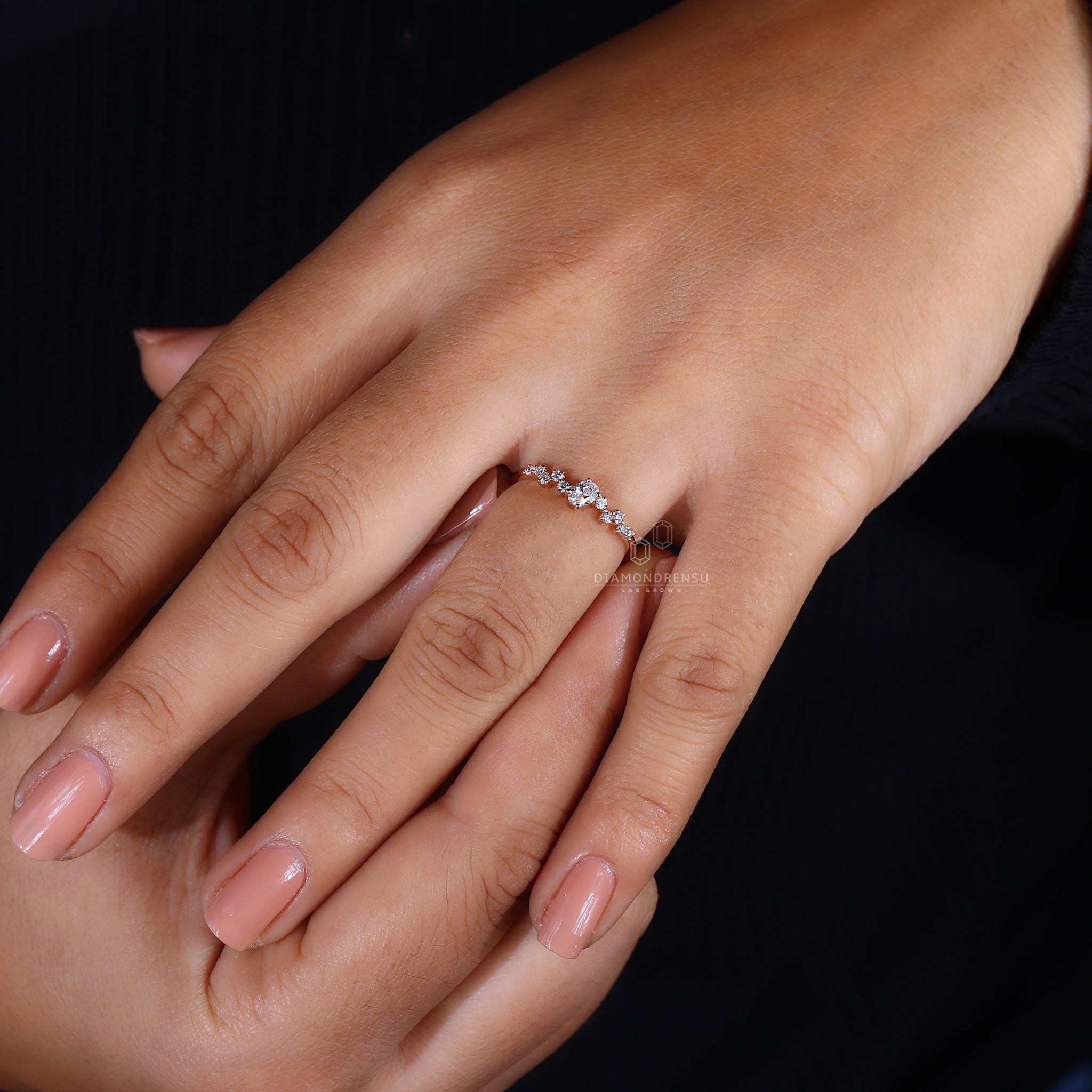 Zig zag ring with oval and round diamonds.
