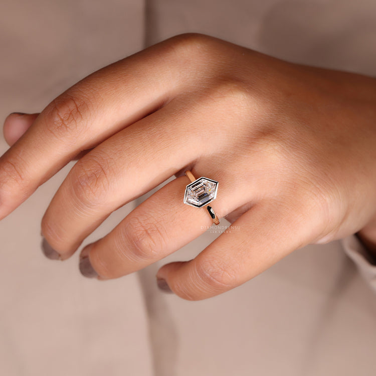 Handmade ring with bezel set engagement ring style.
