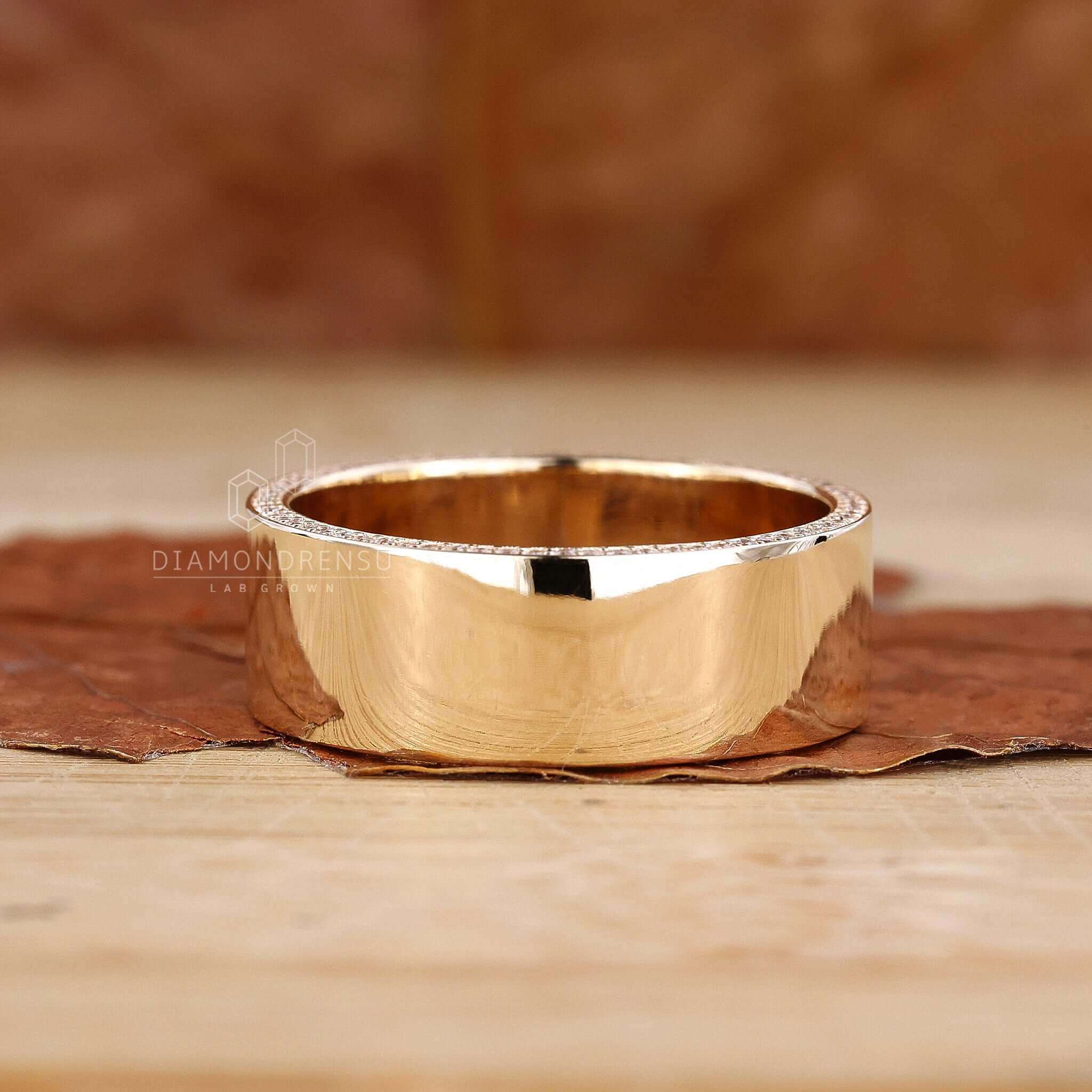 Mens Gold and Diamond Wedding Band combining the beauty of gold and diamonds.