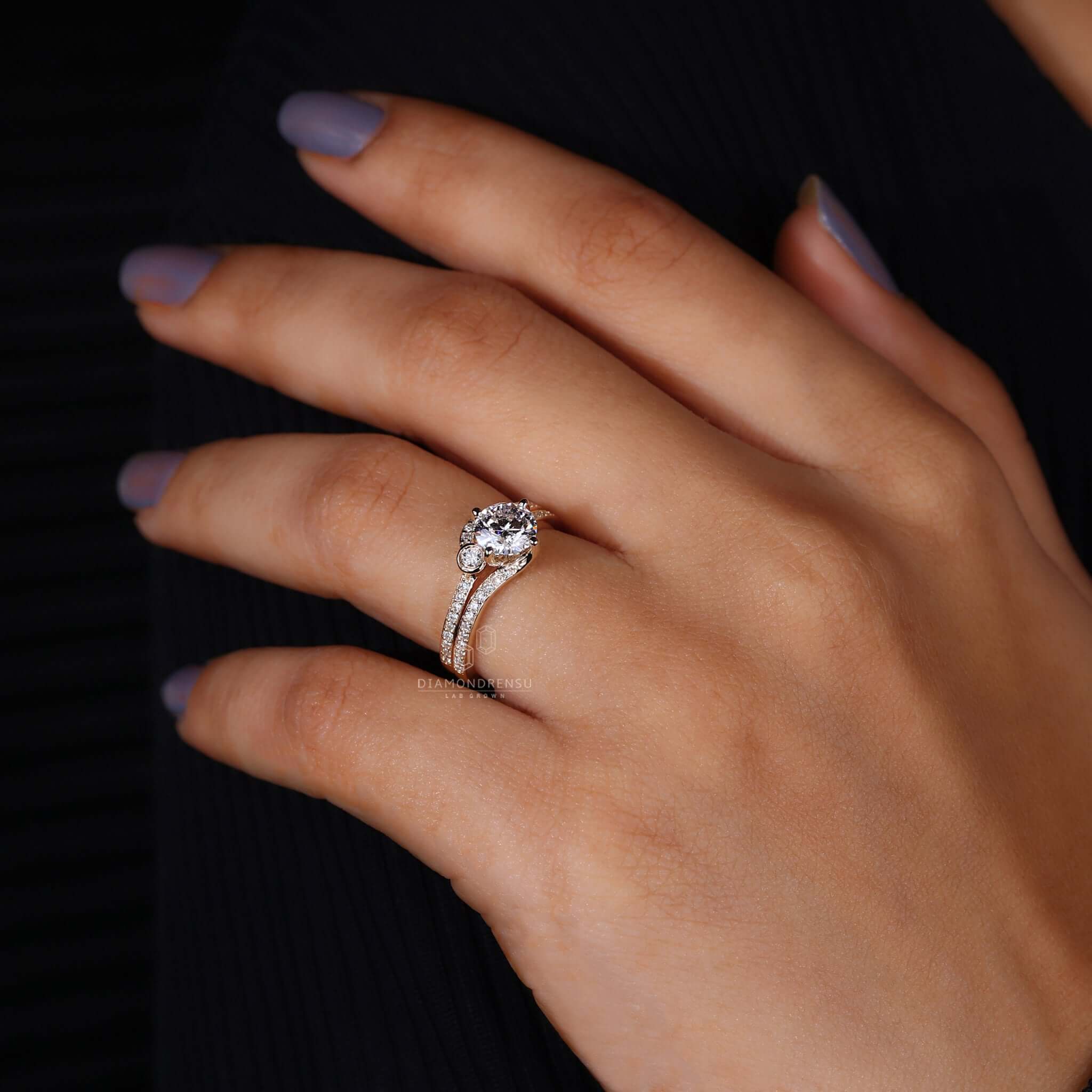 Couple's hands intertwined, wearing gold wedding band sets, symbolizing their united journey