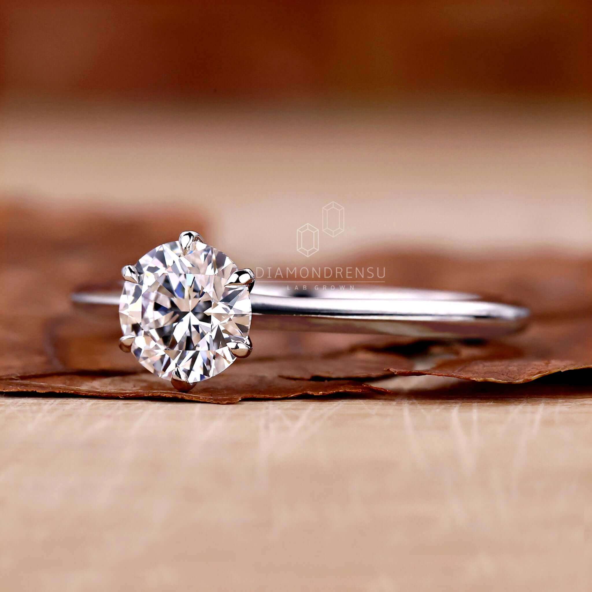 Solitaire engagement ring with a stunning knife edge ring shank.