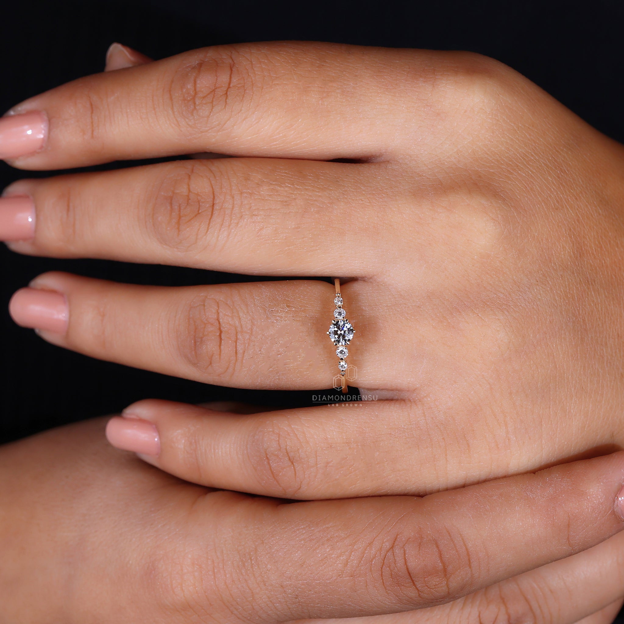 Lab diamond ring in 5 stone yellow gold.
