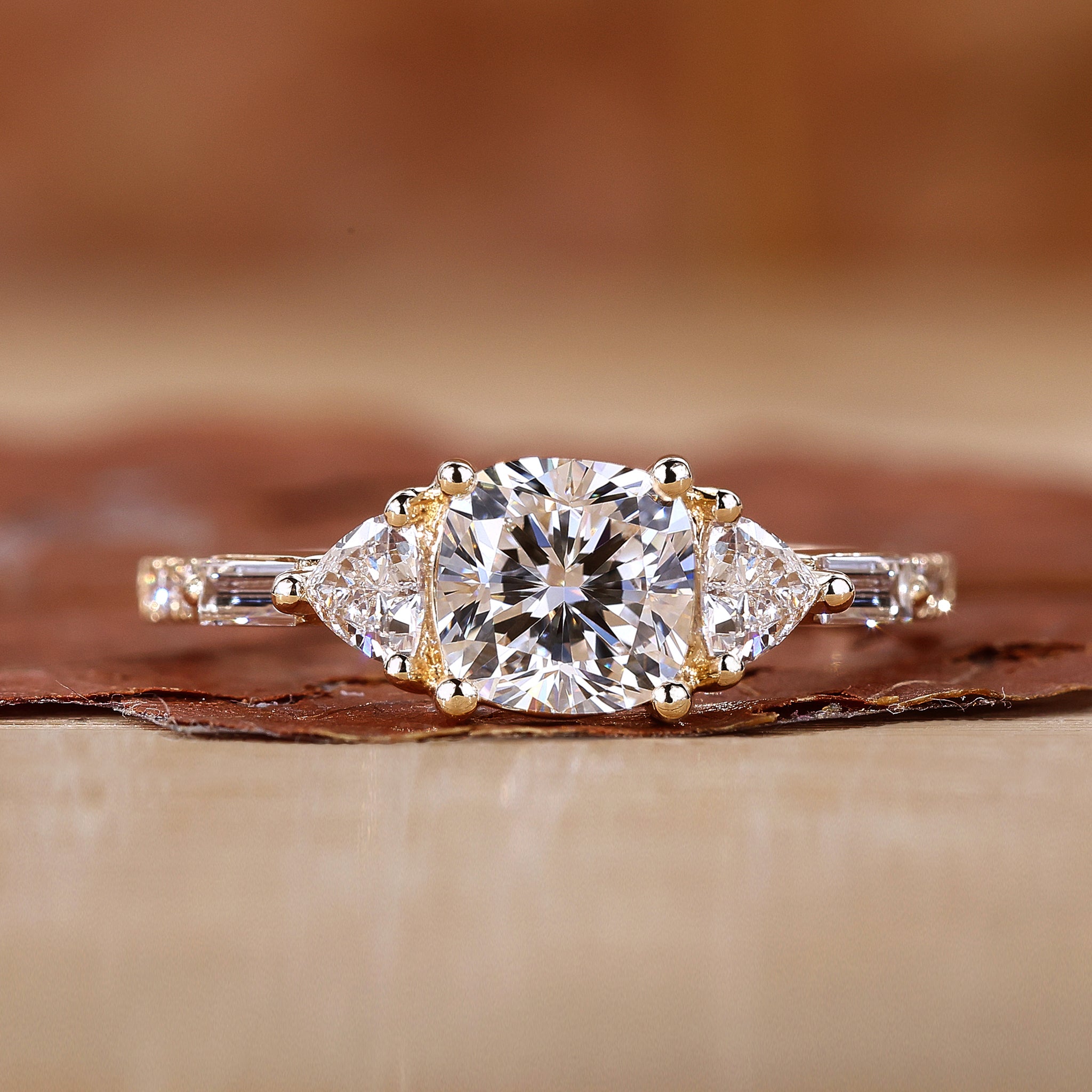 3 stone engagement ring with cushion cut diamond ring.
