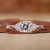 3 stone engagement ring with cushion cut diamond ring.
