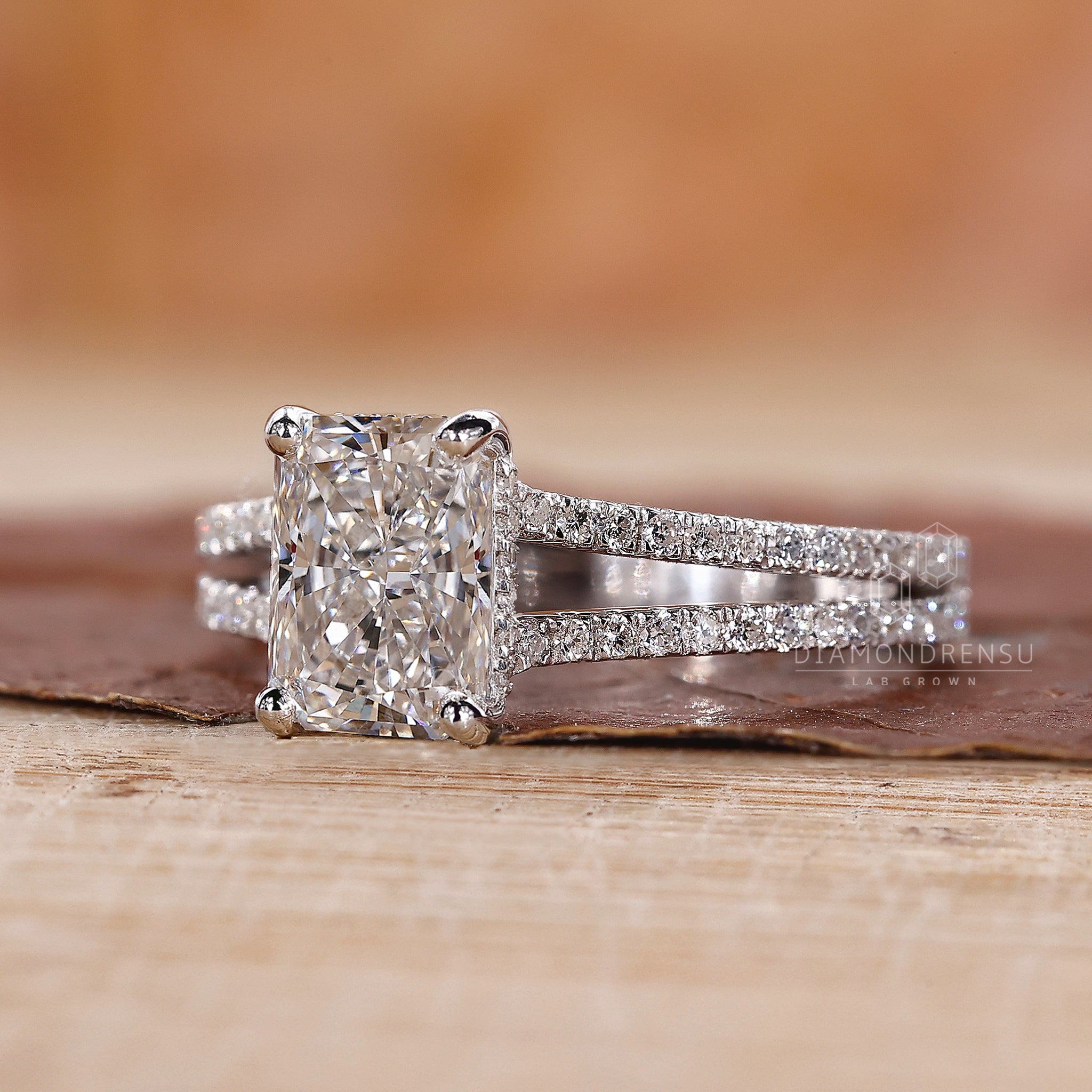 IGI certified custom ring with a split shank pavé band.
