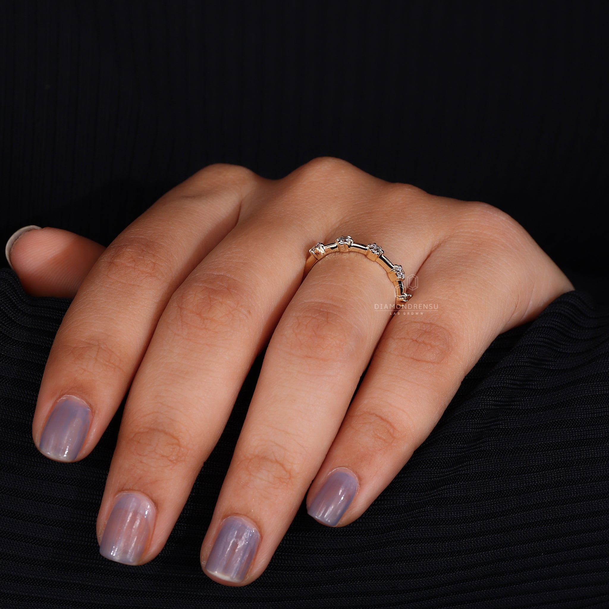 Yellow gold half eternity diamond band with distance pave

