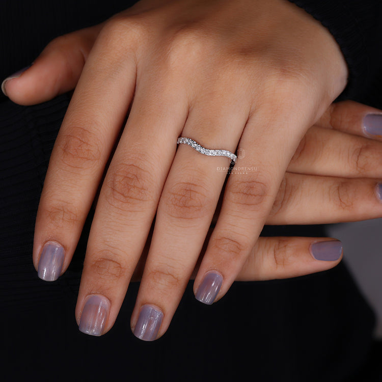 Half eternity white gold diamond wedding band.

