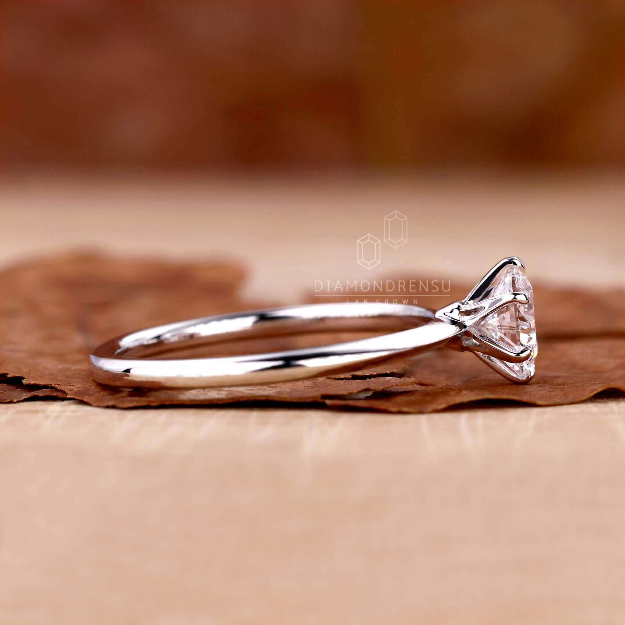 Round cut solitaire ring with a minimalist and elegant aesthetic.