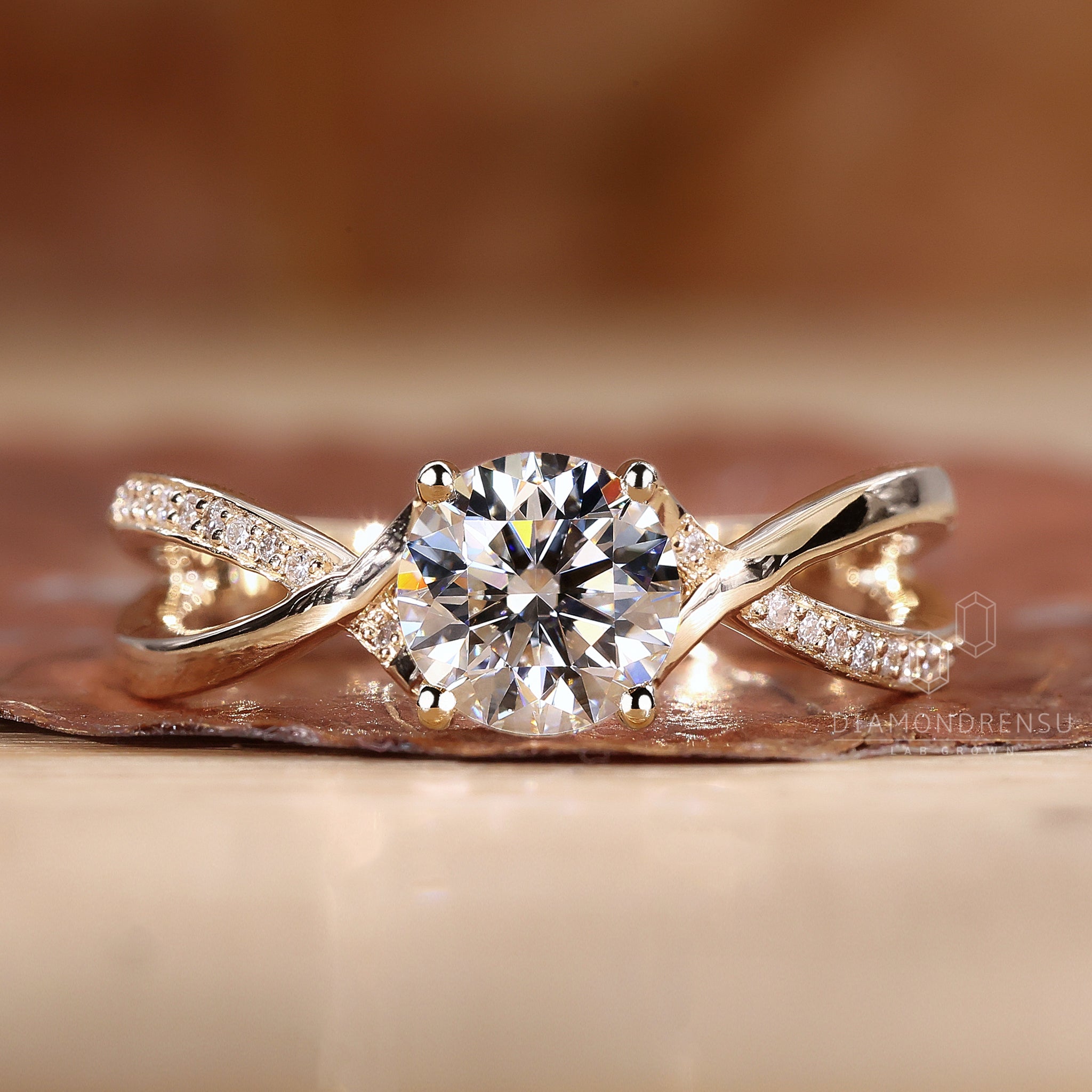 Yellow gold engagement ring with twist.
