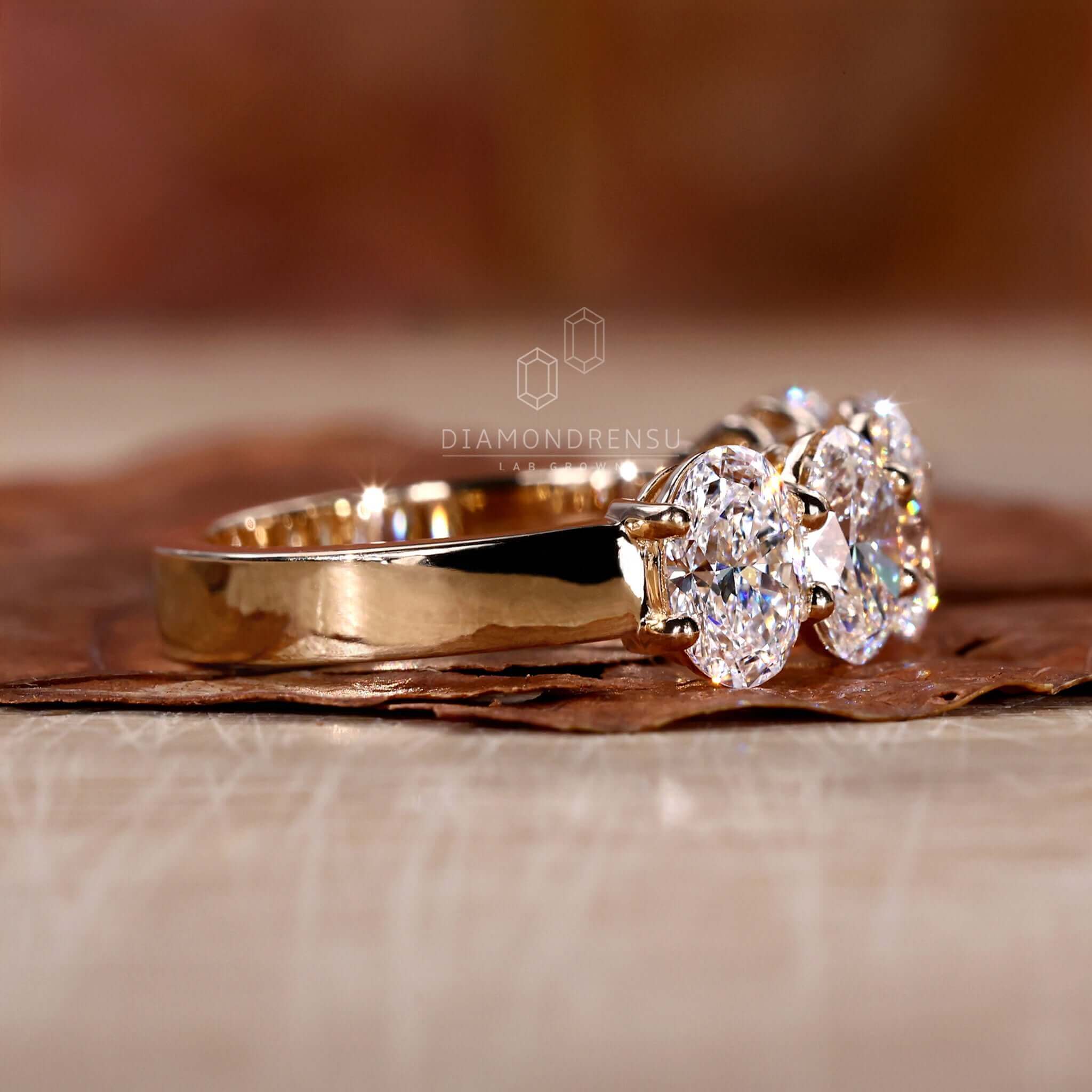 Stunning five stone oval diamond ring in gold setting.