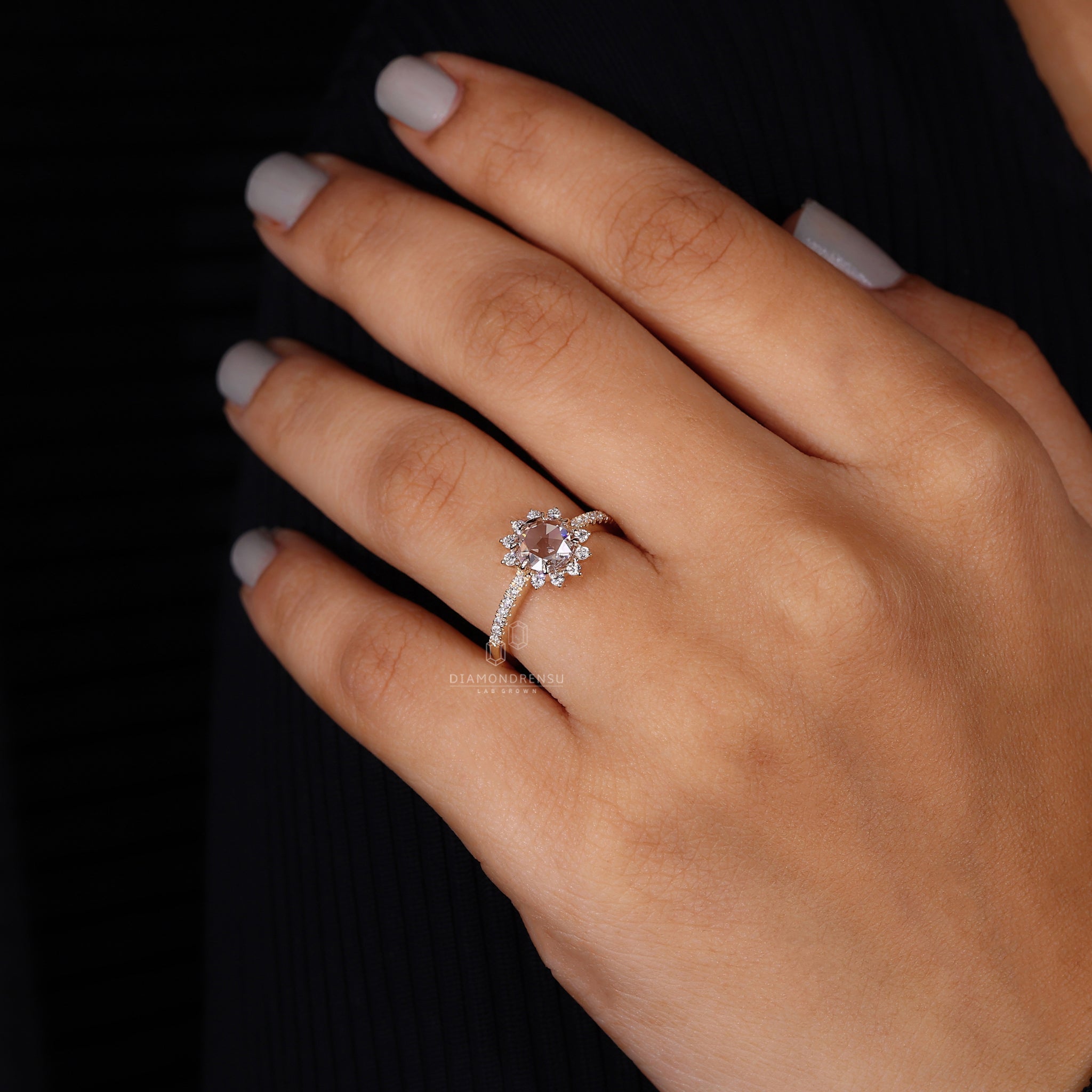 Pave setting ring showcasing the brilliance of small diamonds around the centre.