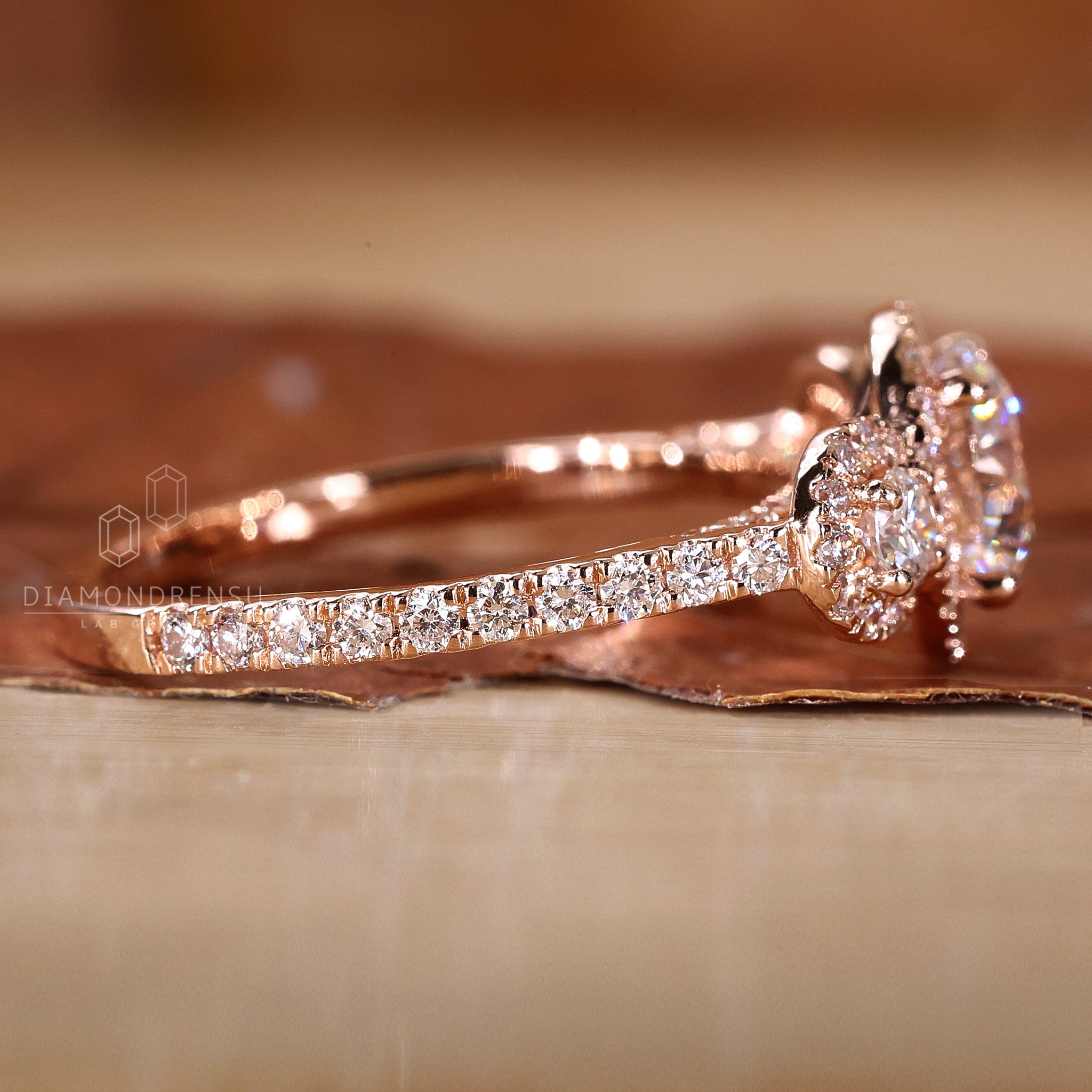 Pave round cut band with halo design.
