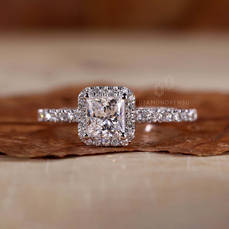 Princess cut halo ring in a handmade jewellery setting, perfect for proposals.