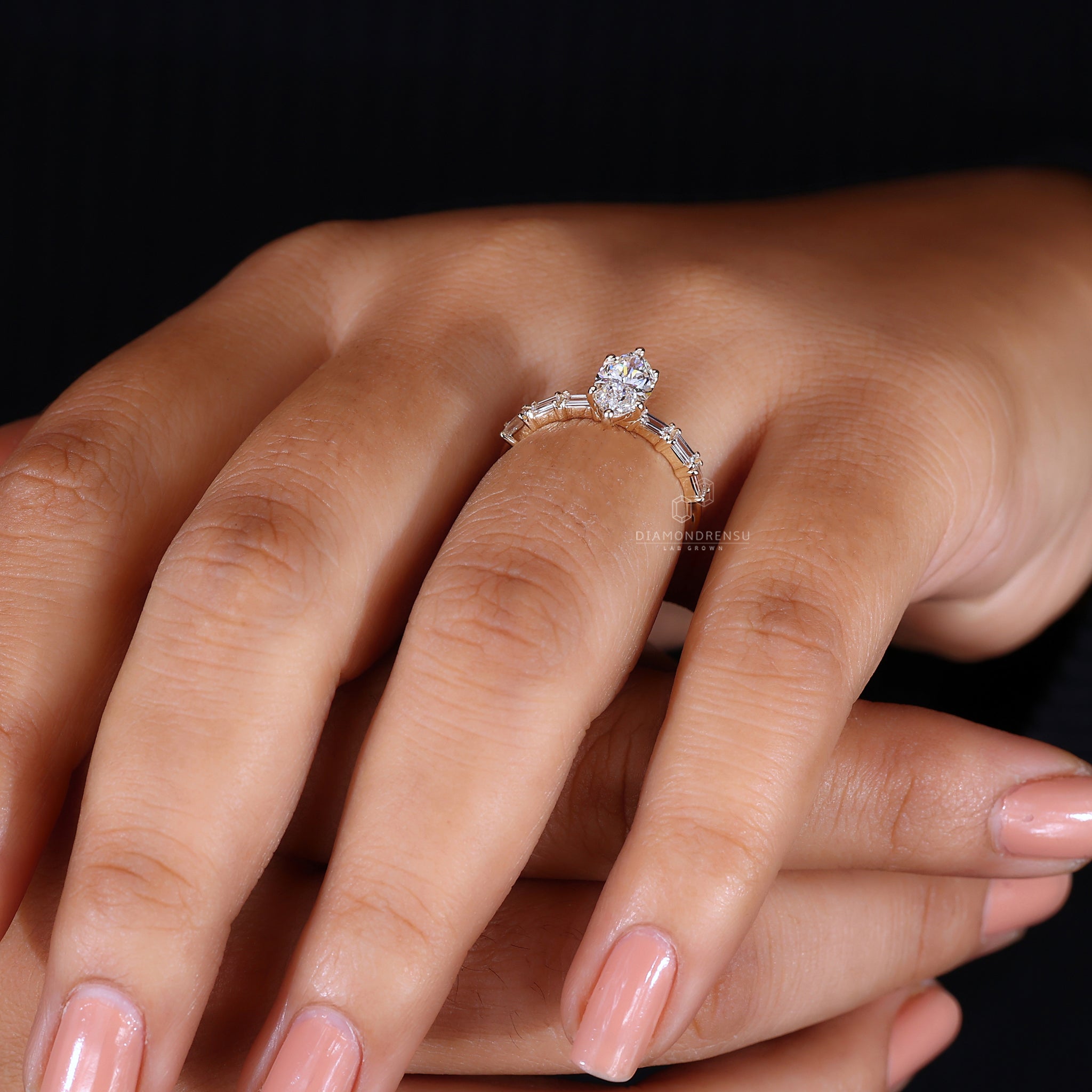 Baguette pave setting yellow gold engagement ring.
