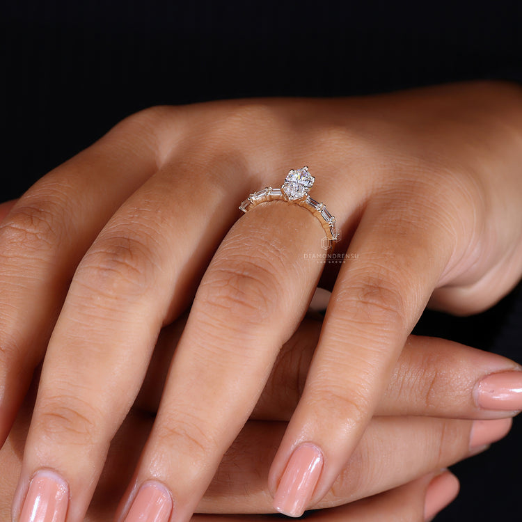Baguette pave setting yellow gold engagement ring.
