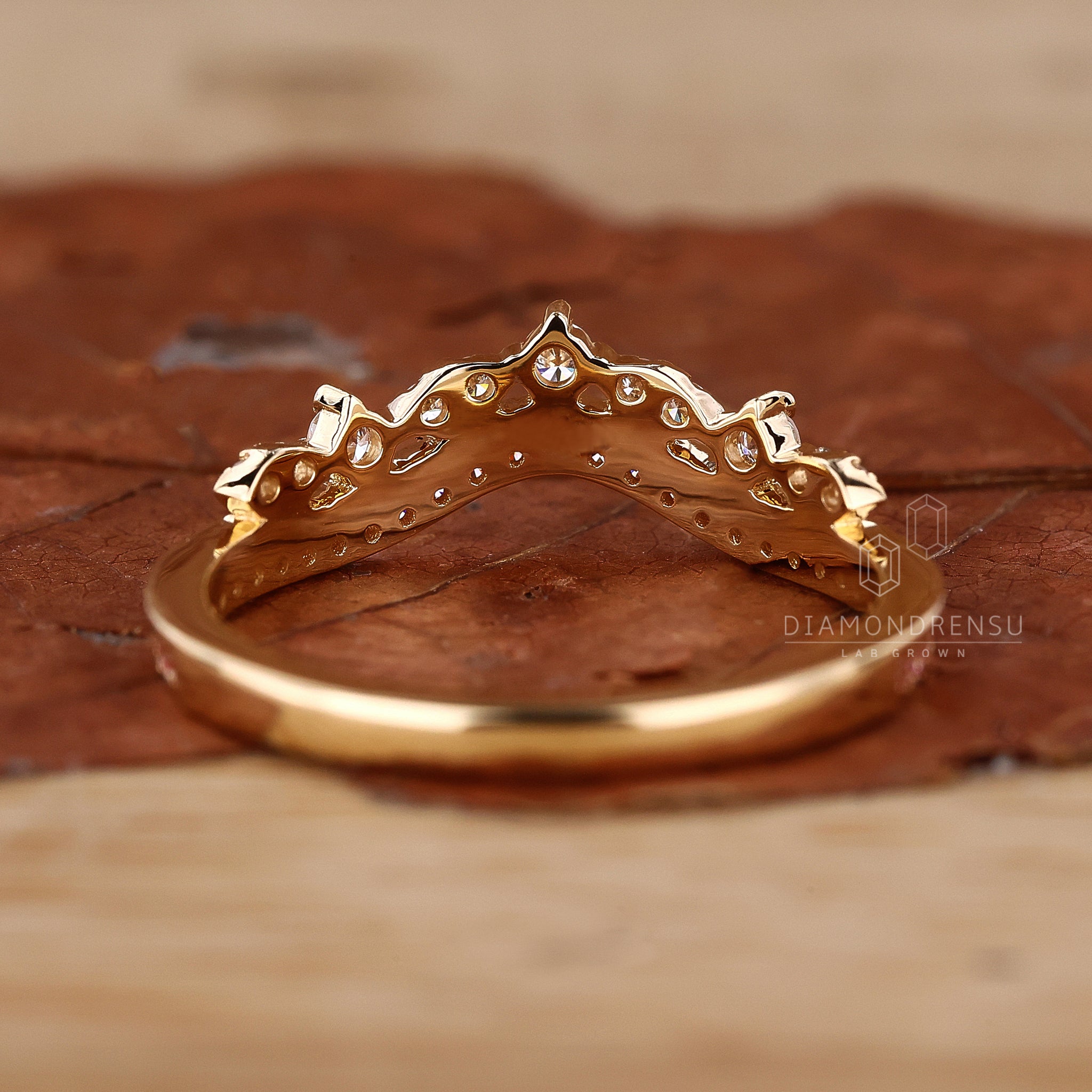 Pink round diamond half eternity wedding band.
