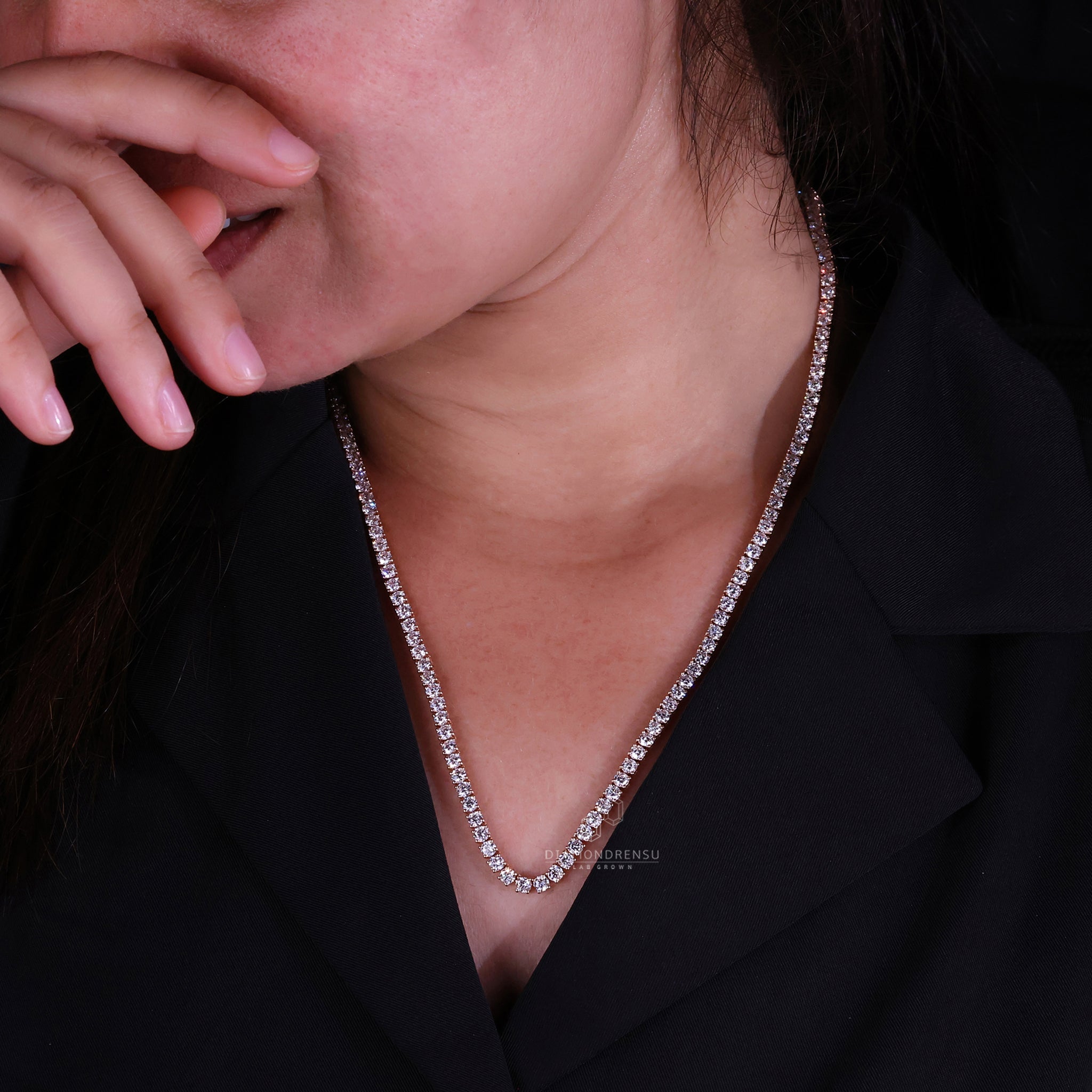 Handmade necklace with round diamonds set in soft rose gold.
