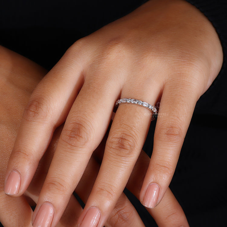 Half eternity wedding ring with mixed diamond cuts.
