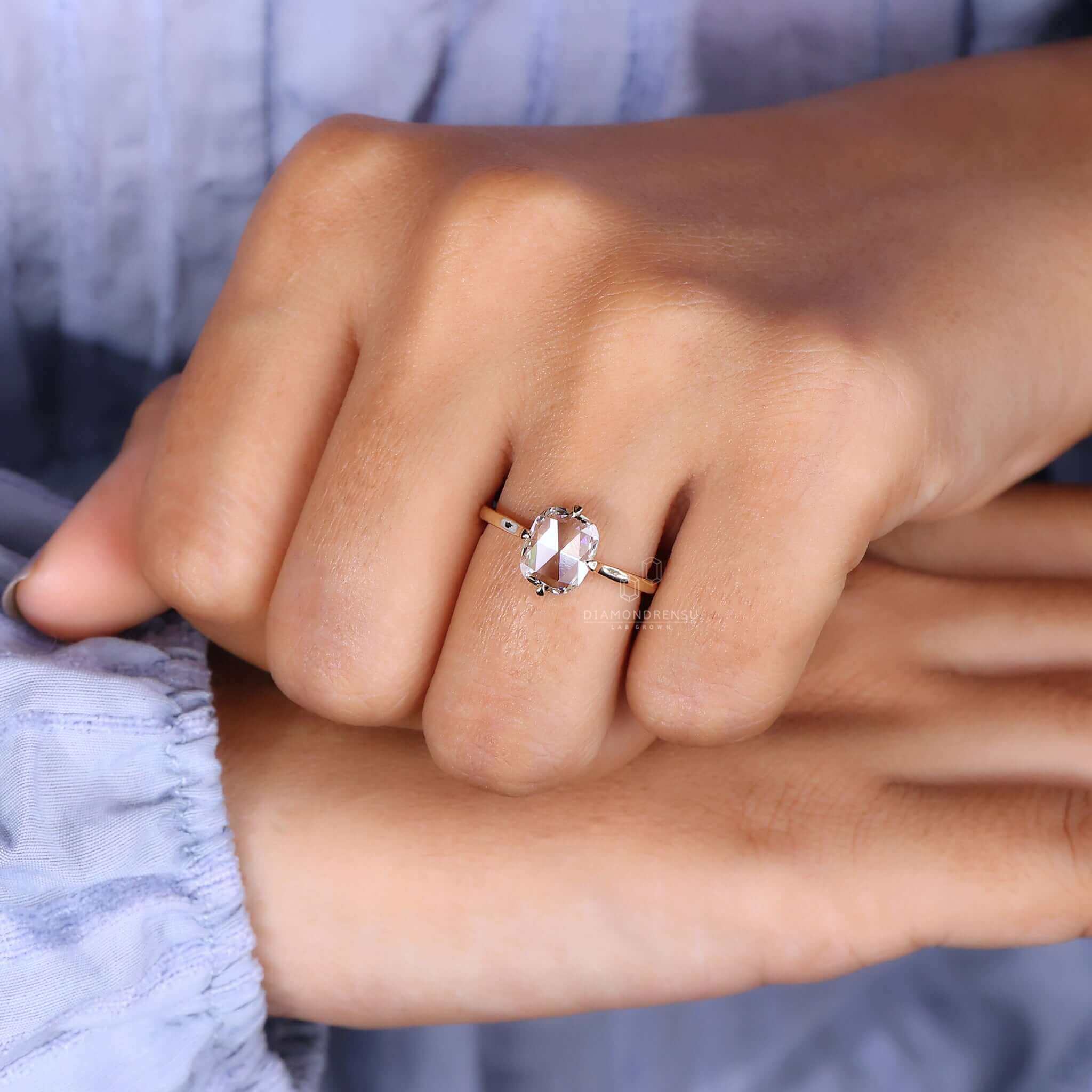 A radiant solitaire and diamond ring, combining simplicity and elegance for the modern bride.