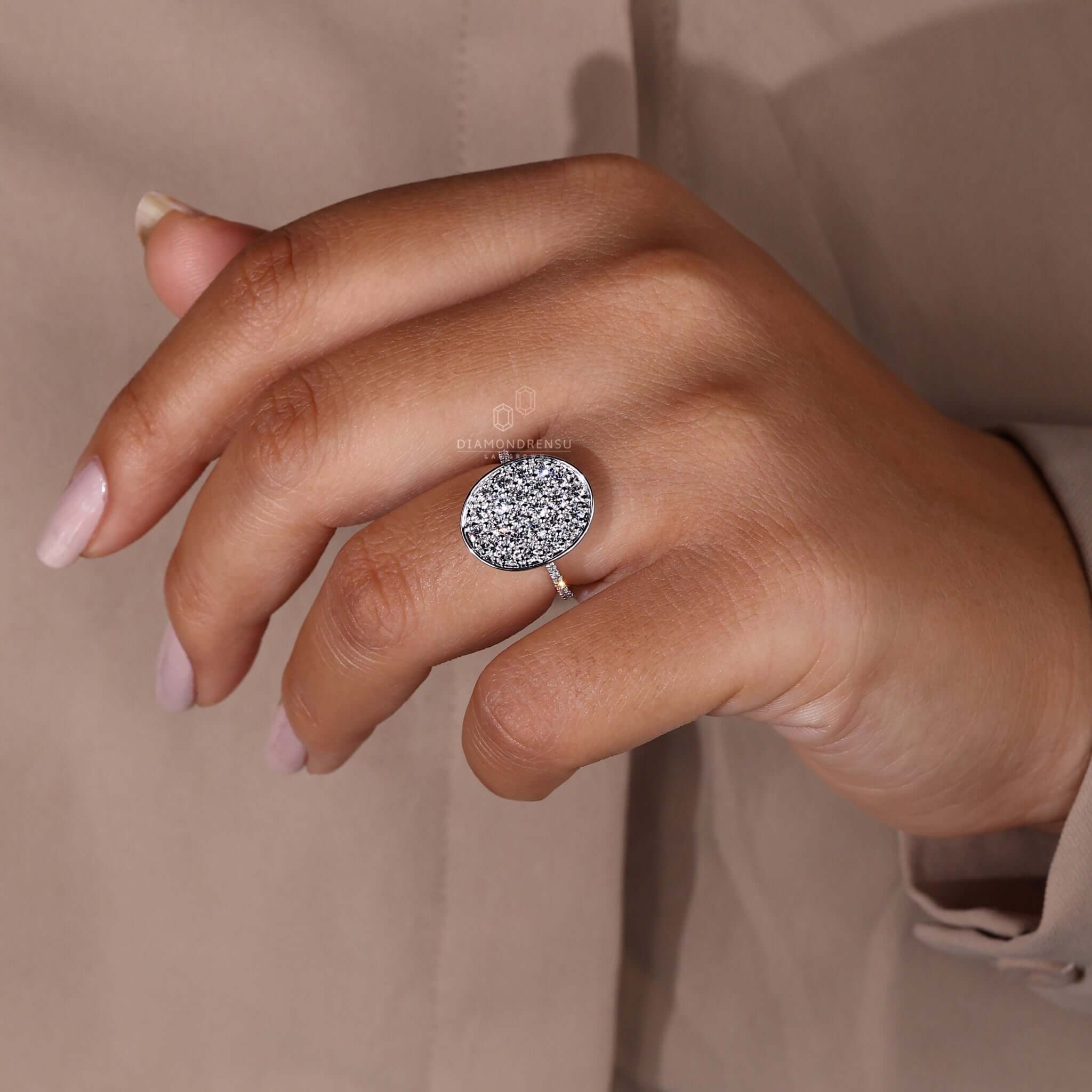 Pave engagement ring with a modern prong setting for women.