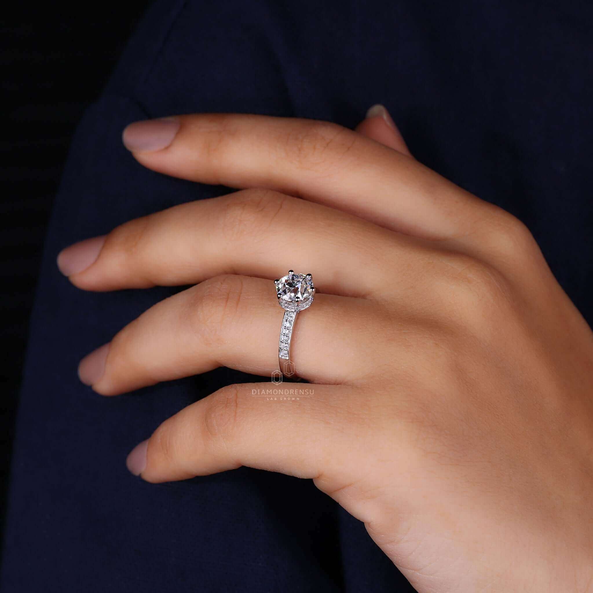 Hidden halo diamond engagement ring radiating timeless brilliance.