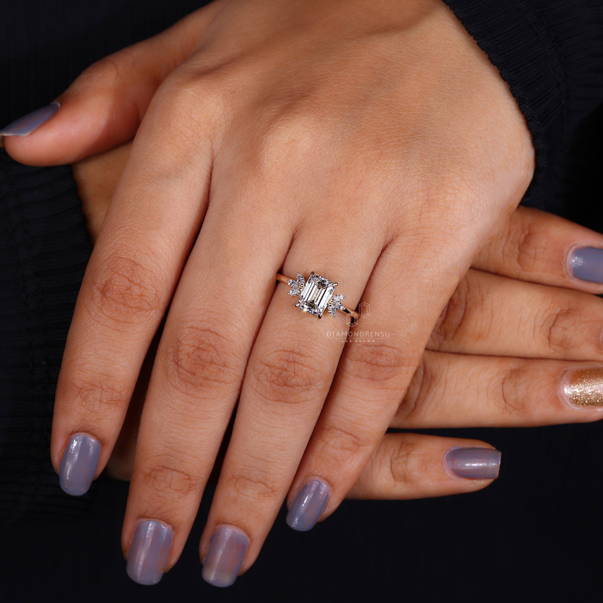 Diamonds London UK marquise side stone ring.
