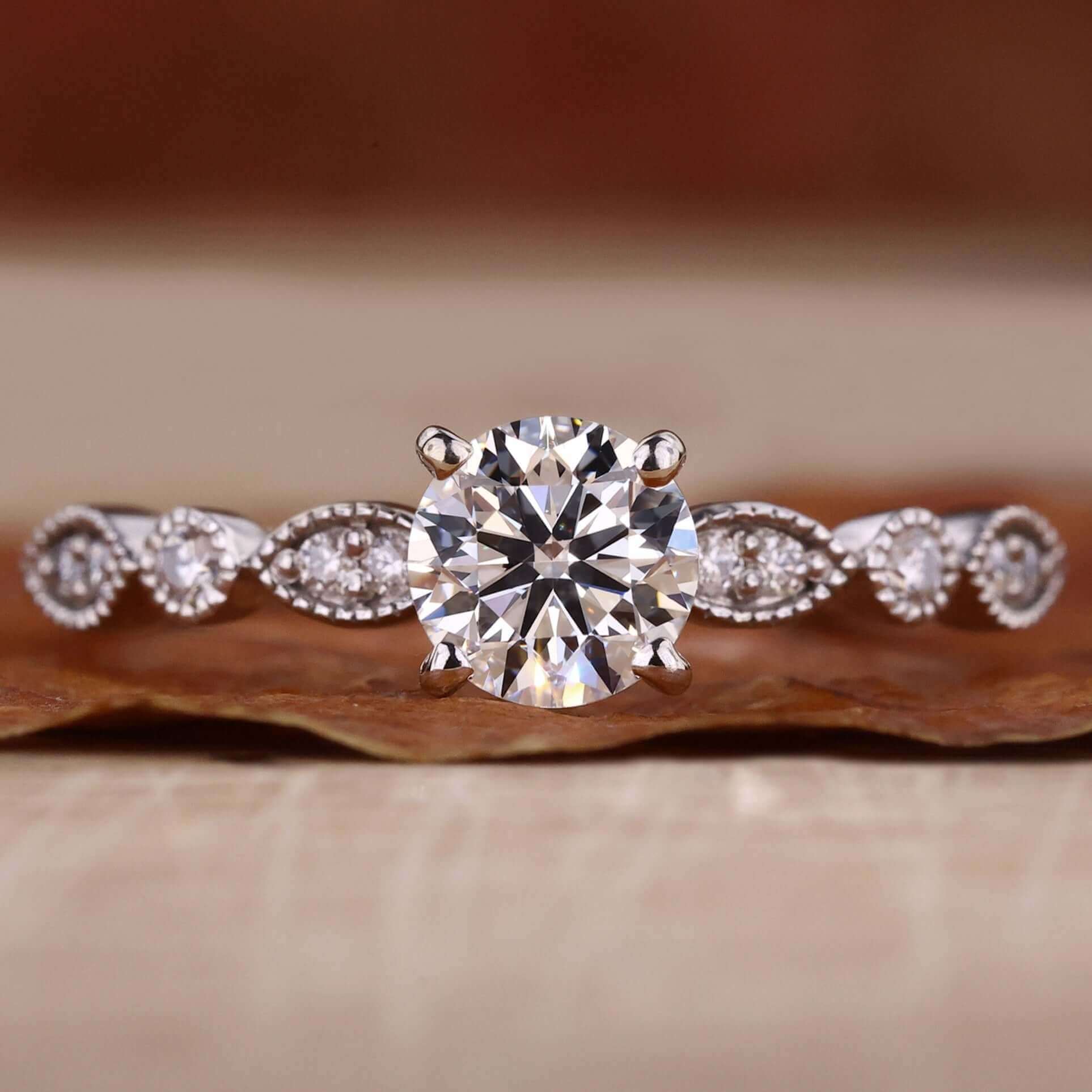 Pave engagement ring with intricate milgrain details for a timeless look.