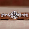 Pave engagement ring with intricate milgrain details for a timeless look.