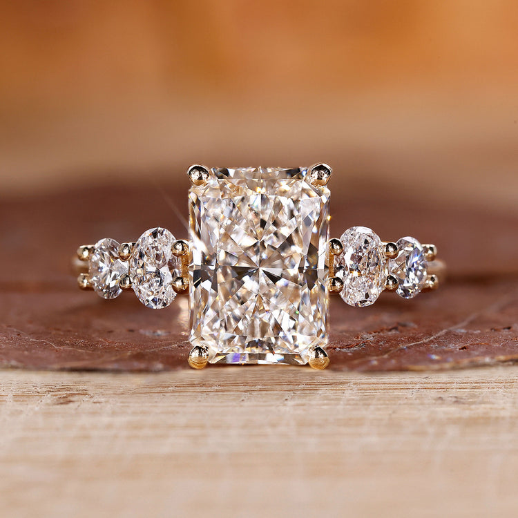 Radiant Cut Diamond Ring is designed in yellow gold ring.
