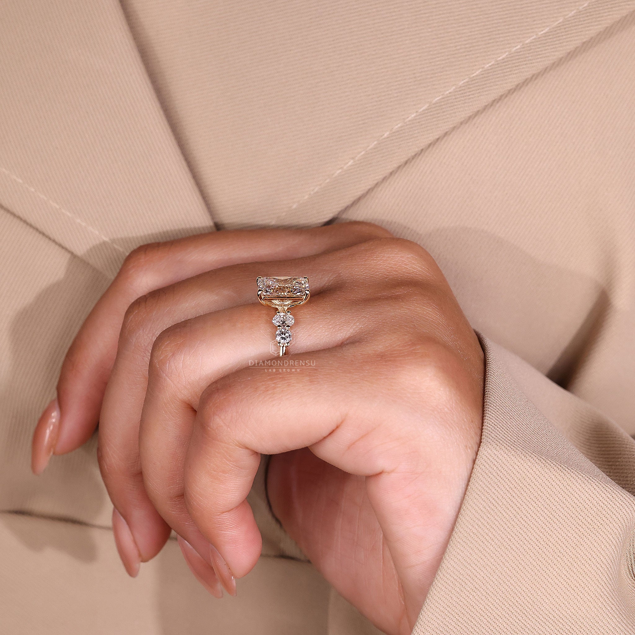 5 stone ring gives the piece a full diamond look.
